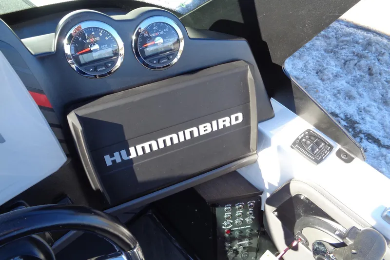 Slide: The Image of 2021 Vexus DVX20 boat dashboard with Humminbird electronics and gauges. - 30