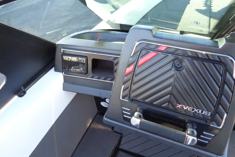 Slide: The Image of 2021 Vexus DVX20 boat dashboard with sleek black and red design. - 40