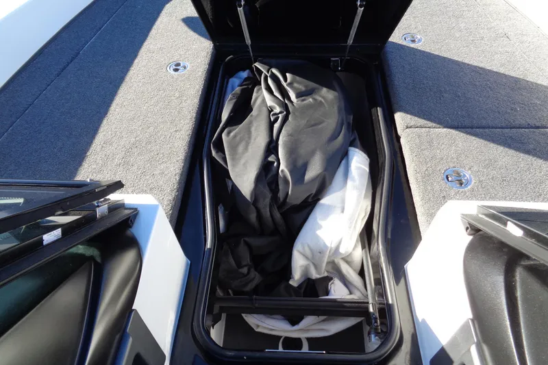 Slide: The Image of Open storage compartment in 2021 Vexus DVX20 boat with fabric inside. - 44