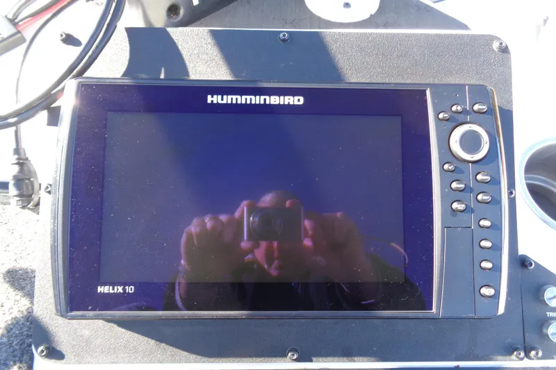 Slide: The Image of Humminbird Helix 10 fish finder on 2021 Vexus DVX20 boat dashboard. - 45
