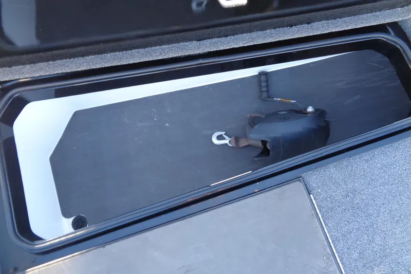 Slide: The Image of 2021 Vexus DVX20 storage compartment with black interior and equipment. - 48