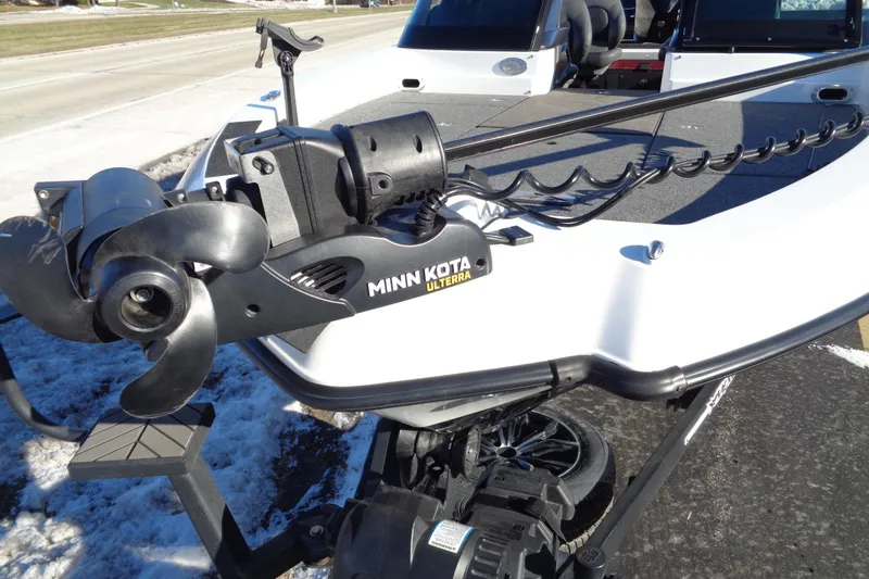 Slide: The Image of 2021 Vexus DVX20 boat with Minn Kota Ulterra trolling motor on snowy pavement. - 8
