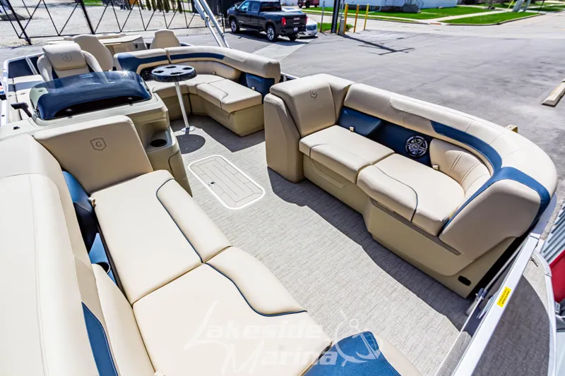 Slide: The Image of Luxurious seating on 2025 Godfrey Sweetwater 2286 FSX pontoon boat at marina. - 10