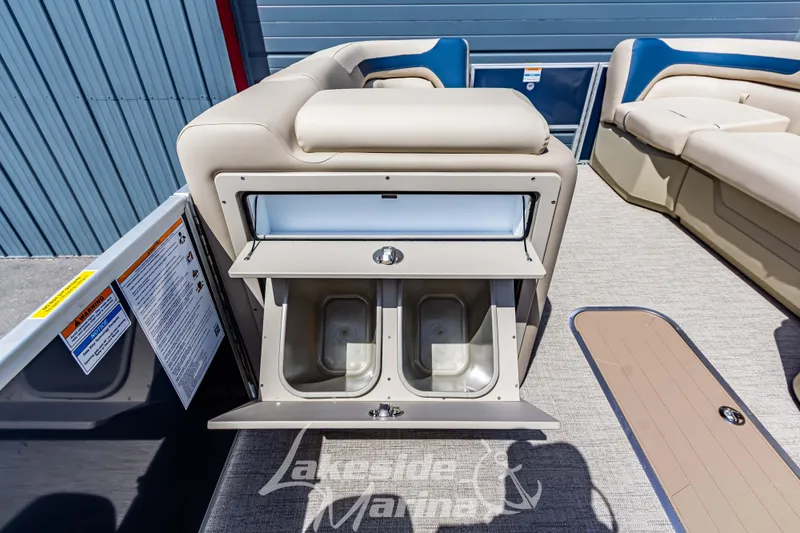 Slide: The Image of 2025 Godfrey Sweetwater 2286 FSX boat interior with storage compartments open. - 17