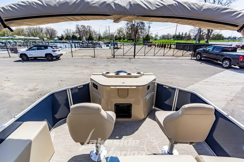 Slide: The Image of 2025 Godfrey Sweetwater 2286 FSX pontoon boat interior with seating and canopy. - 25