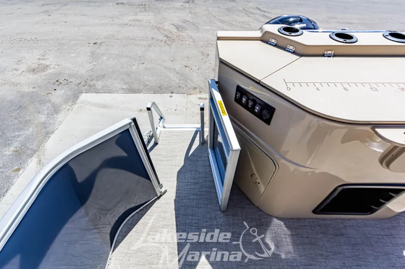 Slide: The Image of 2025 Godfrey Sweetwater 2286 FSX boat deck with open gate and control panel. - 36