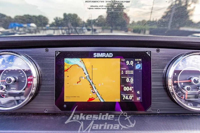 Slide: The Image of Dashboard of 2025 Godfrey Sweetwater 2286 SFL with Simrad navigation display. - 23