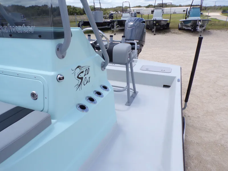 Slide: The Image of 2026 Shoalwater 20' Catamaran on a parking lot. - 22