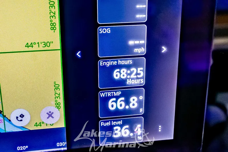 Slide: The Image of Digital display of Tidewater 210 LXF 2025 boat showing engine hours, water temperature, and fuel level. - 29