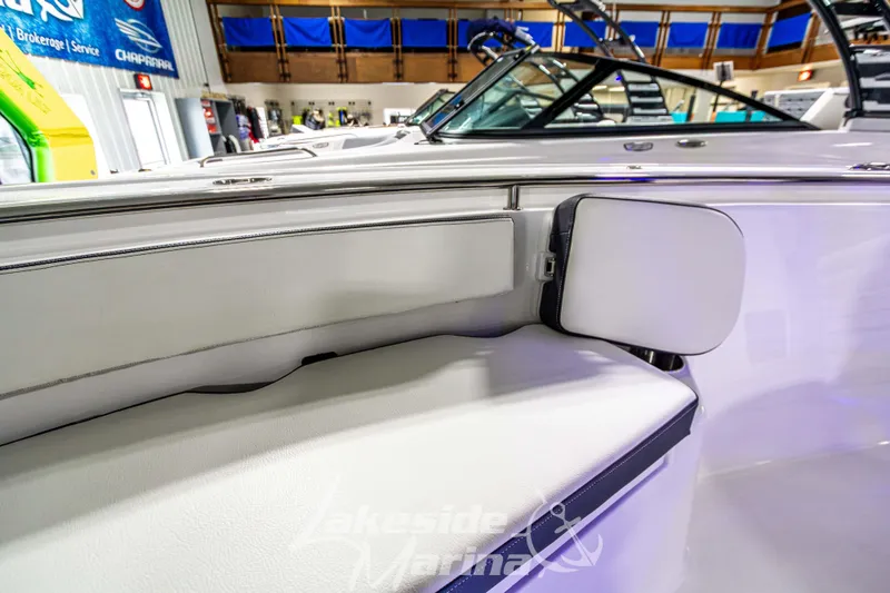 Slide: The Image of 2025 Tidewater 210 LXF boat interior with white seating at Lakeside Marina. - 40