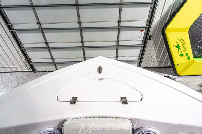 Slide: The Image of 2025 Tidewater 210 LXF boat bow in a garage with Aqua Lily pad. - 46