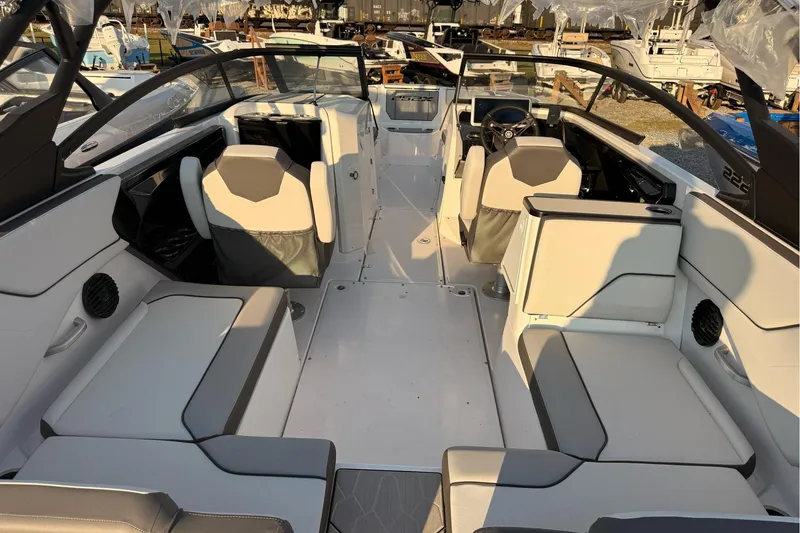 Slide: The Image of 2025 Yamaha Boats 252XE interior with spacious seating and modern design. - 4