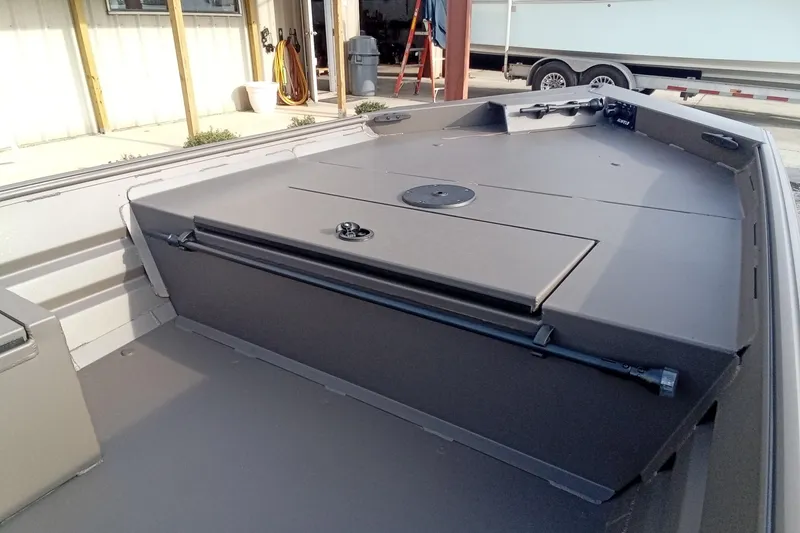 Slide: The Image of 2021 Alweld 1548VV Marsh RD Tiller boat interior with storage compartment. - 10