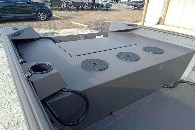 Slide: The Image of 2021 Alweld 1548VV Marsh RD Tiller boat interior with storage compartments and cup holders. - 11