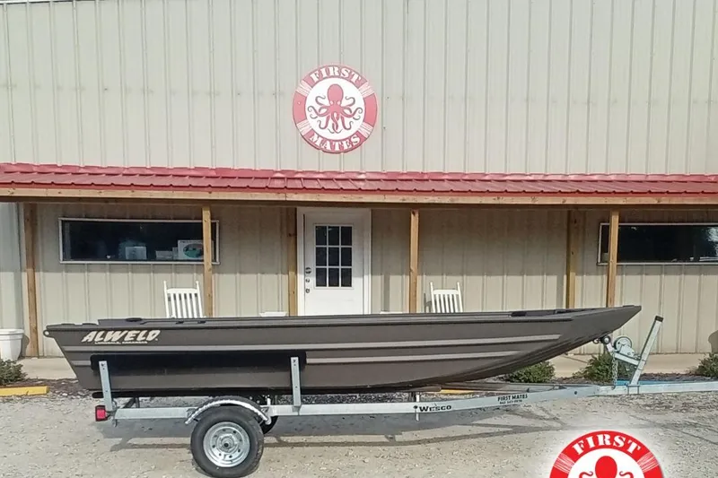 The Image of 2021 Alweld 1548VV Marsh RD Tiller boat on trailer outside First Mates building. - 2