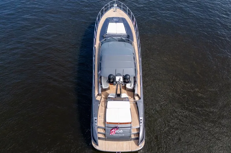 Slide: The Image of Aerial view of 2015 Riva 63 yacht on calm water. - 19