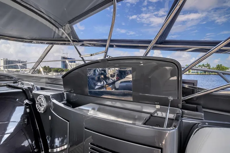 Slide: The Image of Luxurious 2015 Riva 63 yacht interior with sleek design and waterfront view. - 45