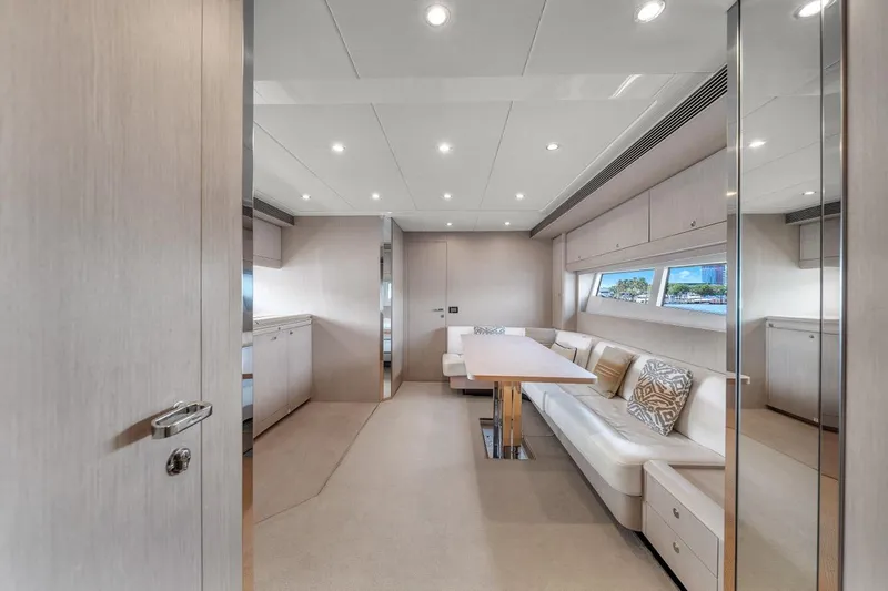 Slide: The Image of Luxurious interior of a 2015 Riva 63 yacht with elegant seating and modern design. - 46