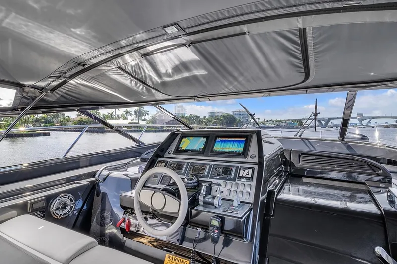 Slide: The Image of Interior view of 2015 Riva 63 yacht cockpit with advanced navigation system. - 42