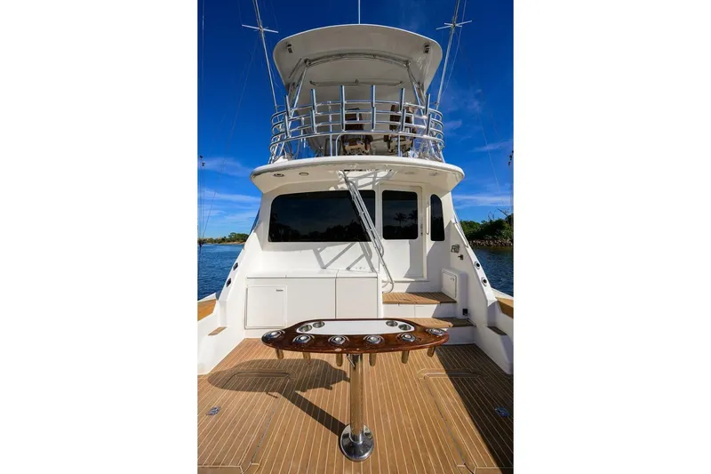 Slide: The Image of 2006 Ocean Yachts 57 Super Sport, rear deck view with fishing rod holders. - 15