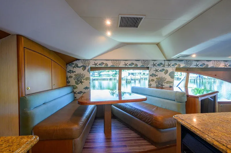 Slide: The Image of Luxurious interior of 2006 Ocean Yachts 57 Super Sport with elegant seating and scenic window view. - 35