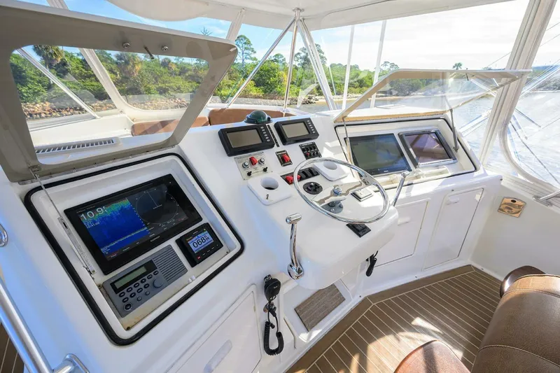 Slide: The Image of Helm of 2006 Ocean Yachts 57 Super Sport with advanced navigation equipment. - 24
