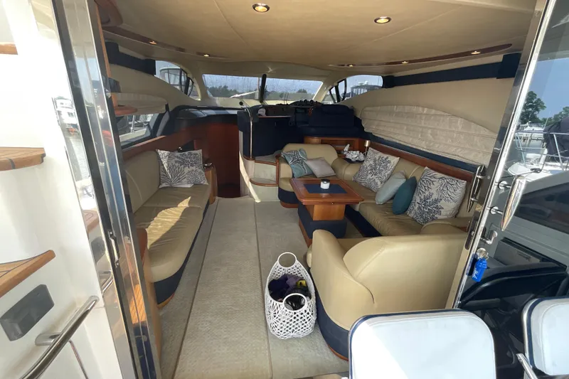 Slide: The Image of Luxurious interior of 2005 Azimut Fly 50 yacht with elegant seating and decor. - 10
