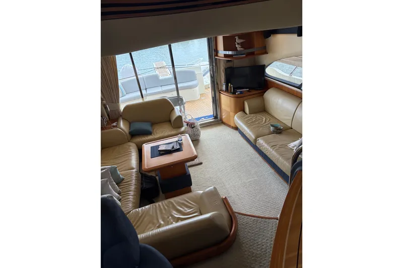 Slide: The Image of Luxurious interior of 2005 Azimut Fly 50 yacht with leather seating and ocean view. - 13