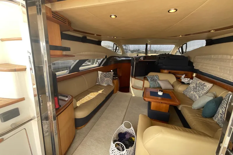 Slide: The Image of Luxurious interior of a 2005 Azimut Fly 50 yacht with elegant seating and decor. - 15