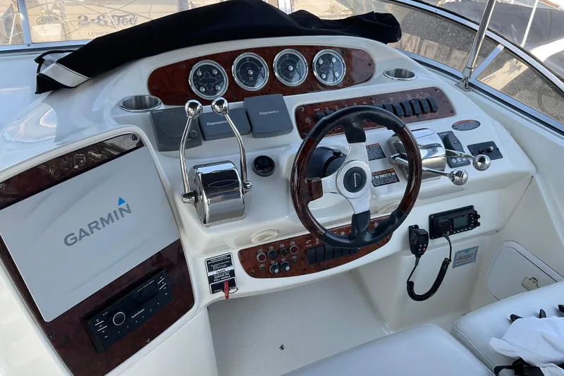 Slide: The Image of Cockpit of 2005 Azimut Fly 50 yacht with Garmin navigation system and steering controls. - 29
