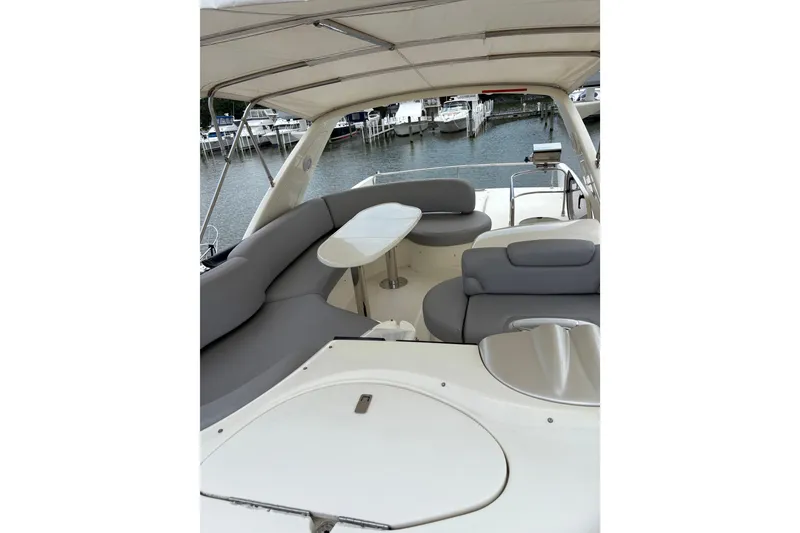 Slide: The Image of Luxurious 2005 Azimut Fly 50 yacht interior with elegant seating and table. - 32