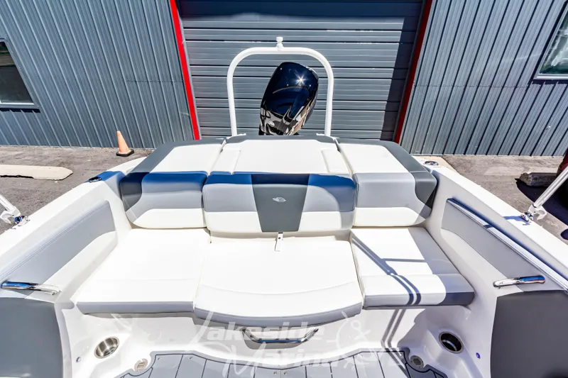 Slide: The Image of 2024 Chaparral 19 SSi OB boat interior with sleek seating and modern design. - 12
