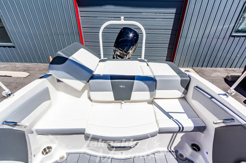 Slide: The Image of 2024 Chaparral 19 SSi OB boat interior with sleek seating and modern design. - 16