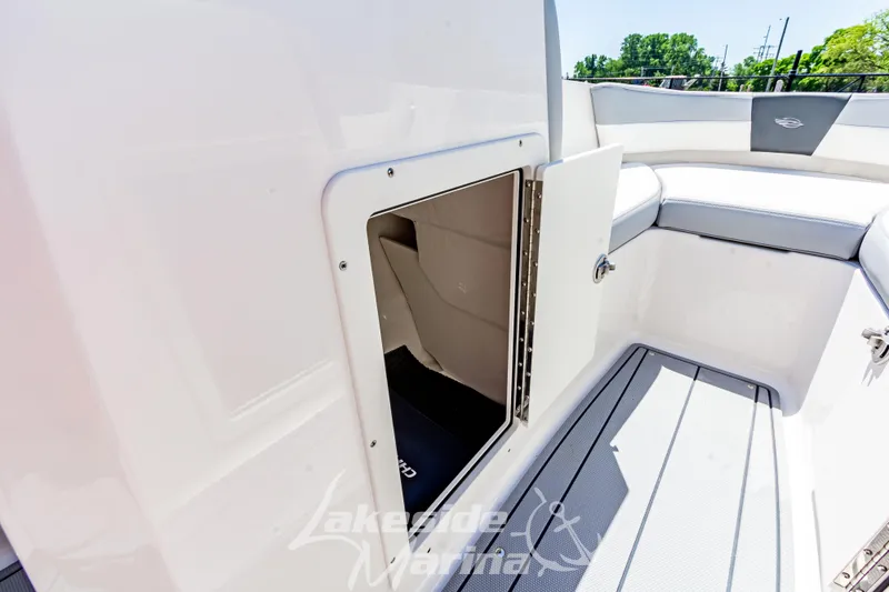 Slide: The Image of 2024 Chaparral 19 SSi OB boat speaker with blue LED lighting. - 26