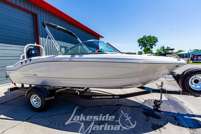 Slide: The Image of 2024 Chaparral 19 SSi OB boat on trailer at Lakeside Marina. - 9