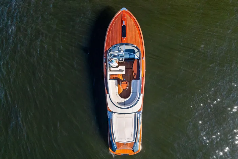 Slide: The Image of Overhead view of 2013 Riva 33 Aquariva luxury boat on water. - 6