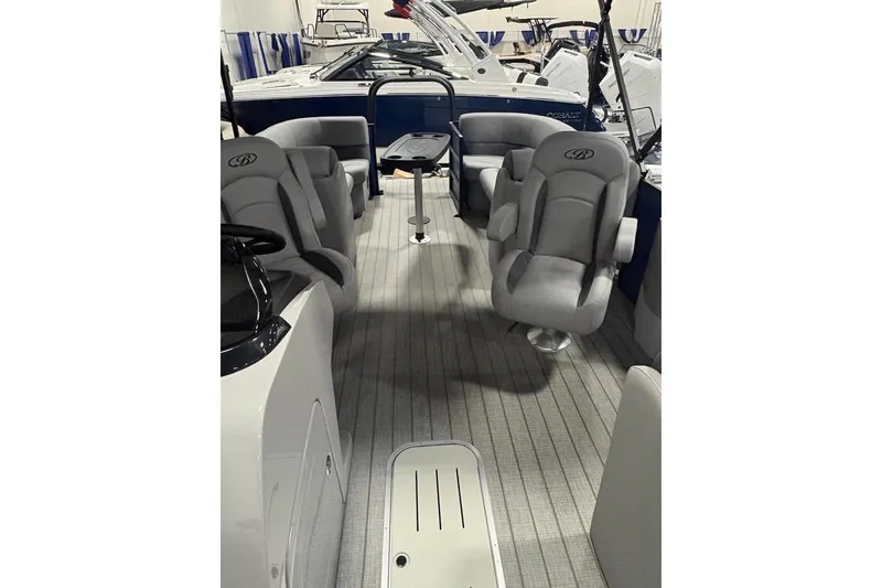Slide: The Image of 2026 Bentley Pontoons Legacy 223 Navigator interior with plush seating and modern design. - 5
