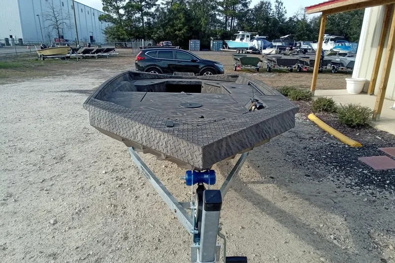 Slide: The Image of 2026 Alweld 1552 Invader boat on trailer in outdoor lot. - 5