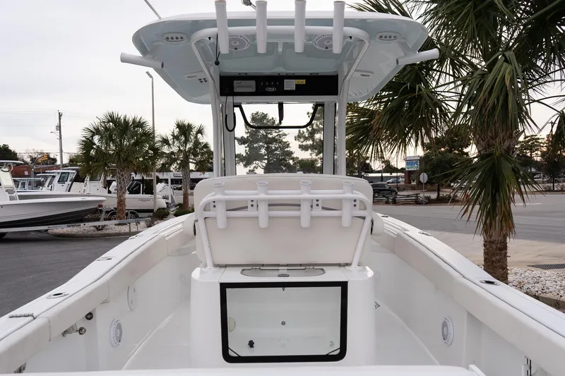 Slide: The Image of 2023 Sea Hunt Gamefish 25 boat interior with T-top and rod holders. - 10