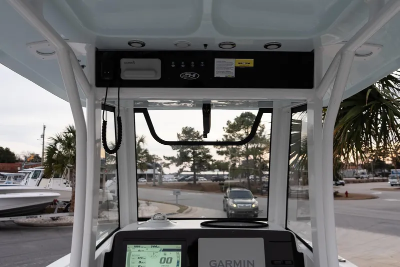 Slide: The Image of 2023 Sea Hunt Gamefish 25 boat console with Garmin navigation system. - 13