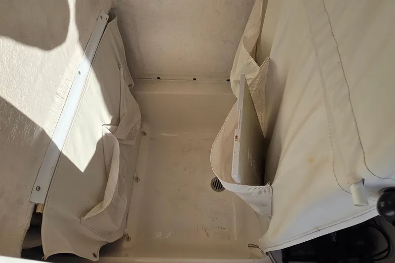 Slide: The Image of Interior storage compartment of a 2018 Key West 219 FS boat. - 7