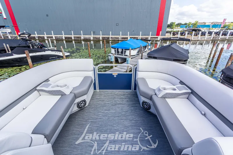 Slide: The Image of 2024 Godfrey Sweetwater 2286 SBX pontoon boat interior at Lakeside Marina dock. - 14