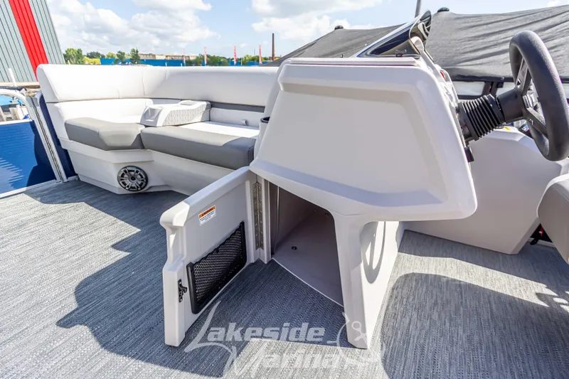 Slide: The Image of 2024 Godfrey Sweetwater 2286 SBX pontoon boat interior with seating and helm. - 19