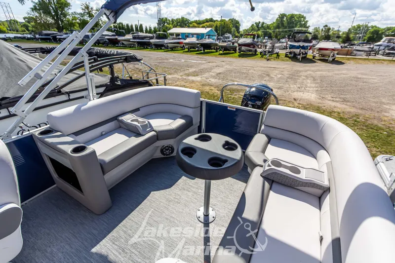 Slide: The Image of 2024 Godfrey Sweetwater 2286 SBX pontoon boat interior with seating and table. - 27
