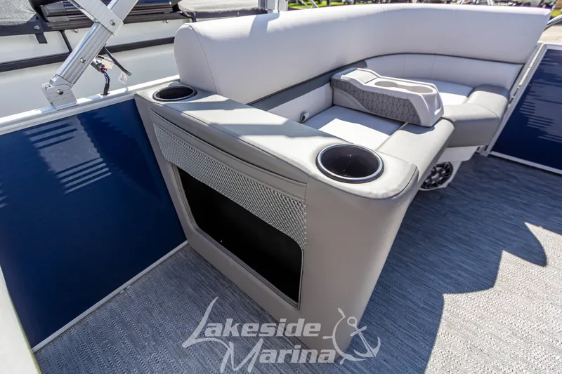 Slide: The Image of 2024 Godfrey Sweetwater 2286 SBX pontoon boat interior with cushioned seating and cup holders. - 29