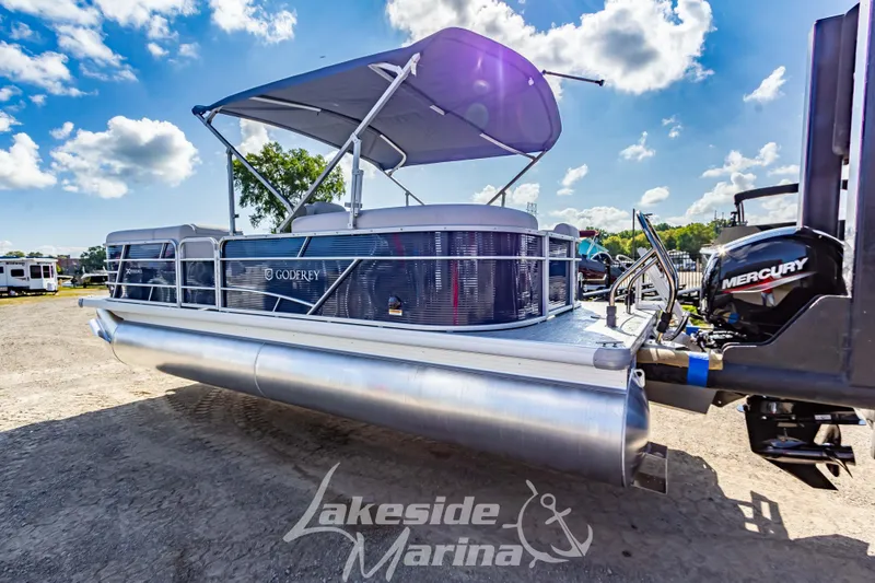 Slide: The Image of 2024 Godfrey Sweetwater 2286 SBX pontoon boat at Lakeside Marina, featuring Mercury outboard. - 4
