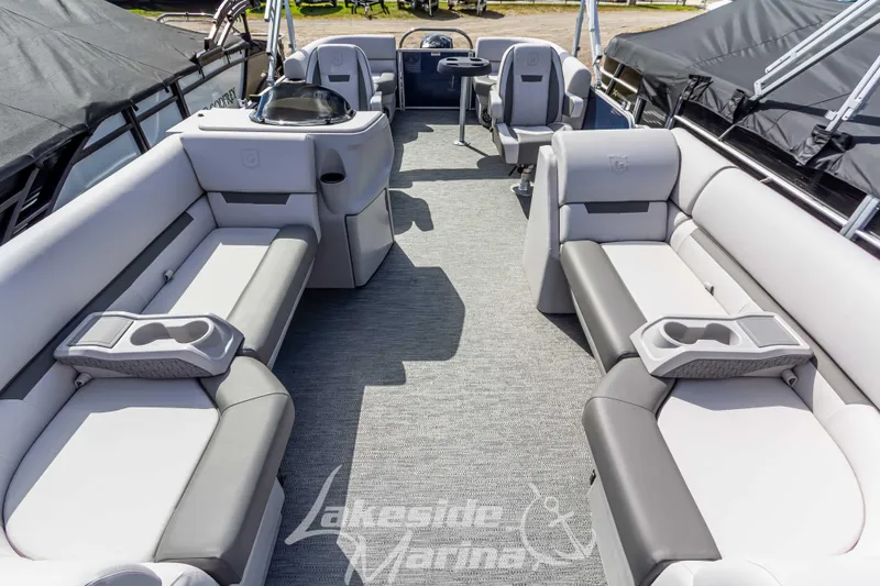Slide: The Image of 2024 Godfrey Sweetwater 2286 SBX pontoon boat interior with spacious seating and modern design. - 8