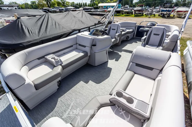 Slide: The Image of 2024 Godfrey Sweetwater 2286 SBX pontoon boat interior with plush seating and modern design. - 9