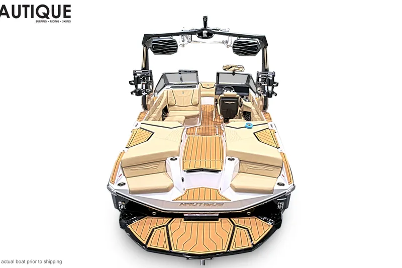 Slide: The Image of 2026 Nautique Super Air Nautique G23 boat, featuring luxurious seating and advanced wakeboard tower. - 3