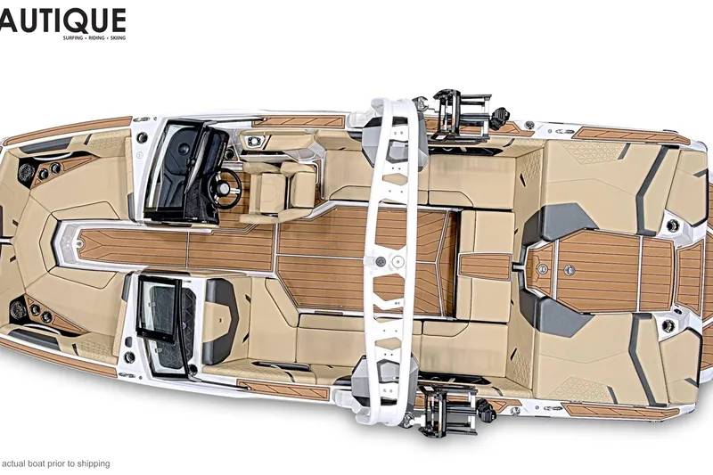 Slide: The Image of 2026 Nautique Super Air Nautique GS22 boat, top view, showcasing sleek design and spacious interior. - 7